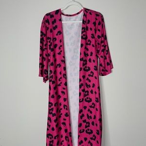 Pink and black cheetah print bathing suit cover up